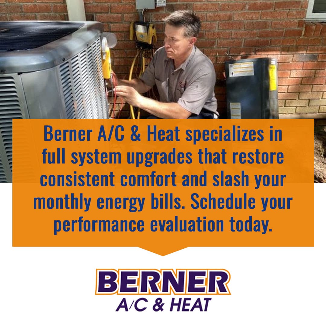 Technician servicing outdoor air conditioning unit to improve efficiency and reduce energy costs